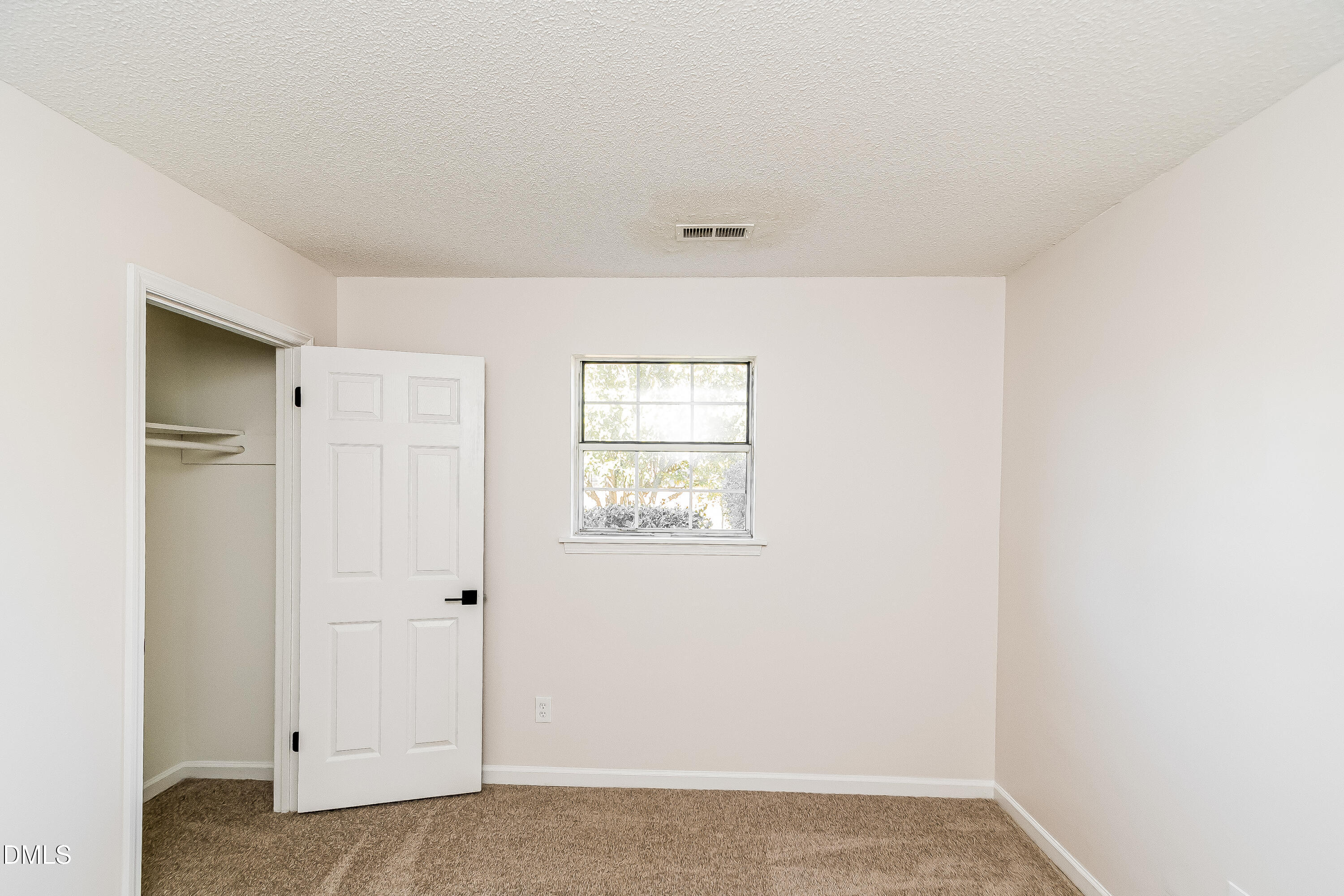 418 Craven Street Durham, NC 27704 - Photo 9 of 14 a view of an empty room