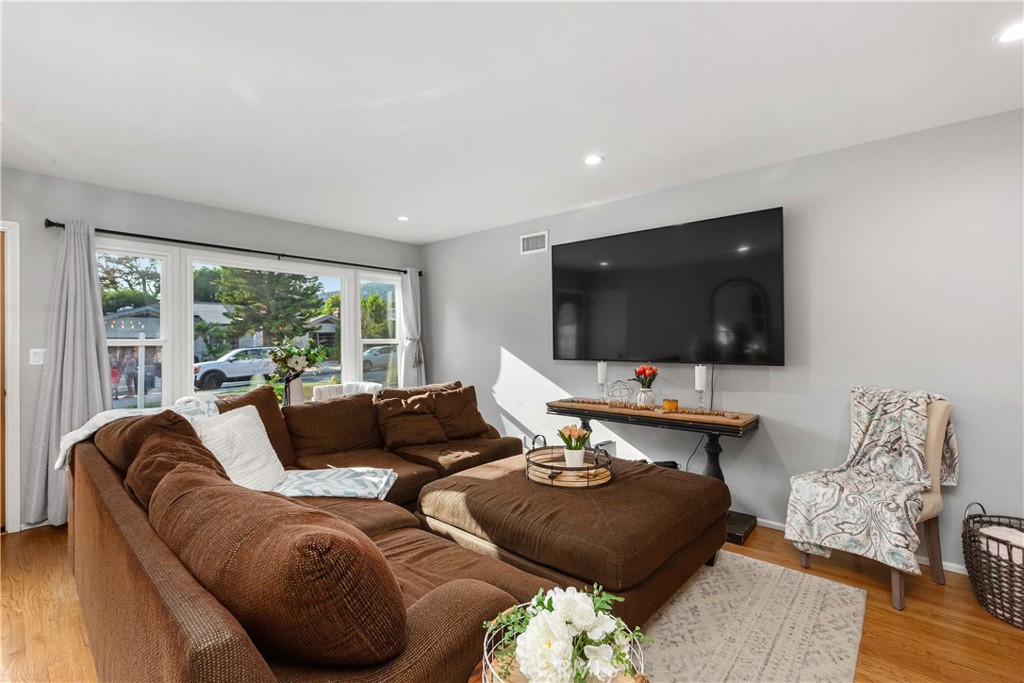 206 Melrose Avenue Monrovia, CA 91016 - Photo 11 of 35 a living room with furniture and a flat screen tv