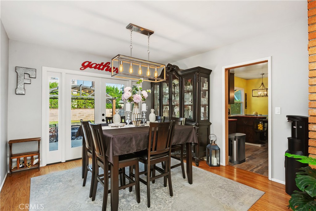 206 Melrose Avenue Monrovia, CA 91016 - Photo 14 of 35 a view of a dining room with furniture window and wooden floor