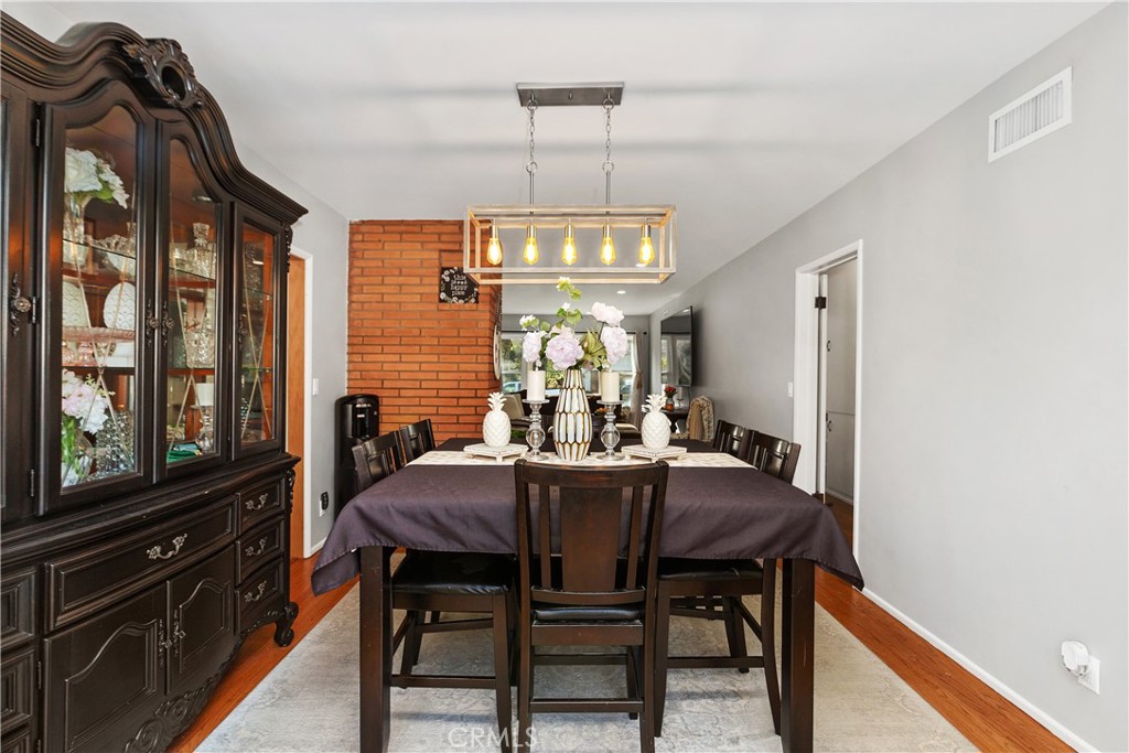 206 Melrose Avenue Monrovia, CA 91016 - Photo 15 of 35 a view of a dining room with furniture window and outside view