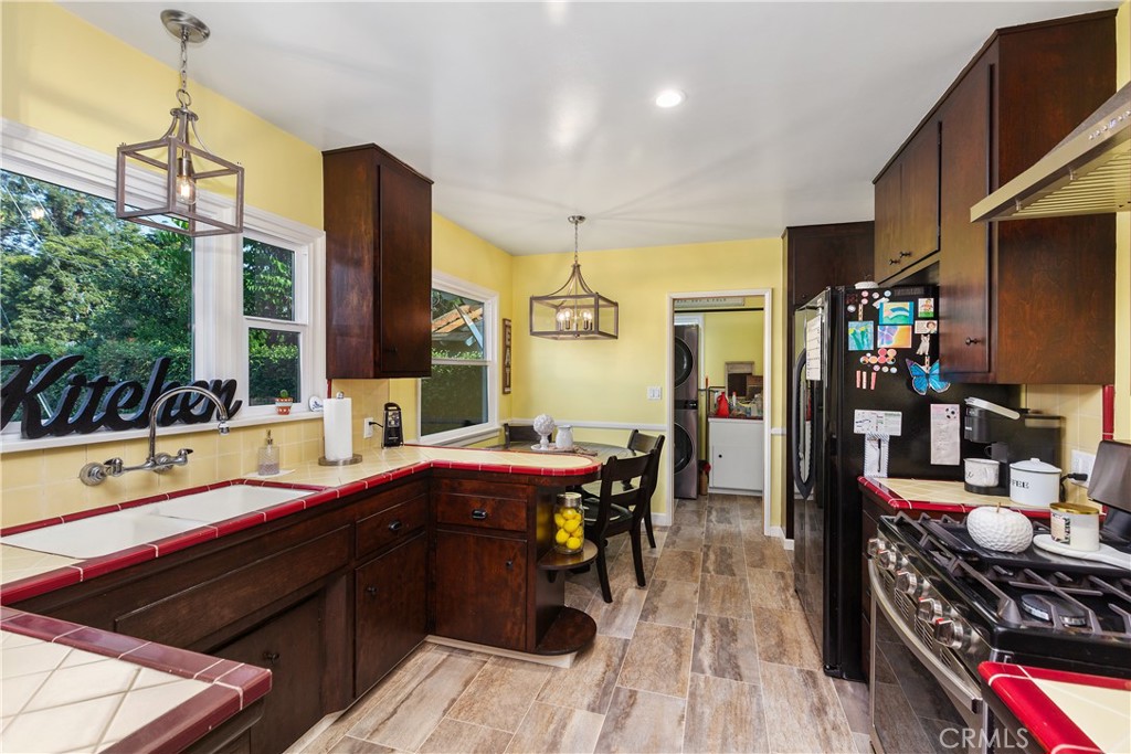 206 Melrose Avenue Monrovia, CA 91016 - Photo 17 of 35 a kitchen with a sink appliances and cabinets