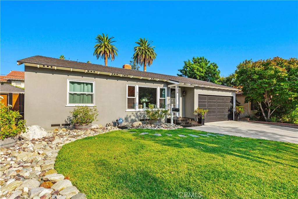 206 Melrose Avenue Monrovia, CA 91016 - Photo 2 of 35 a view of a house with a patio