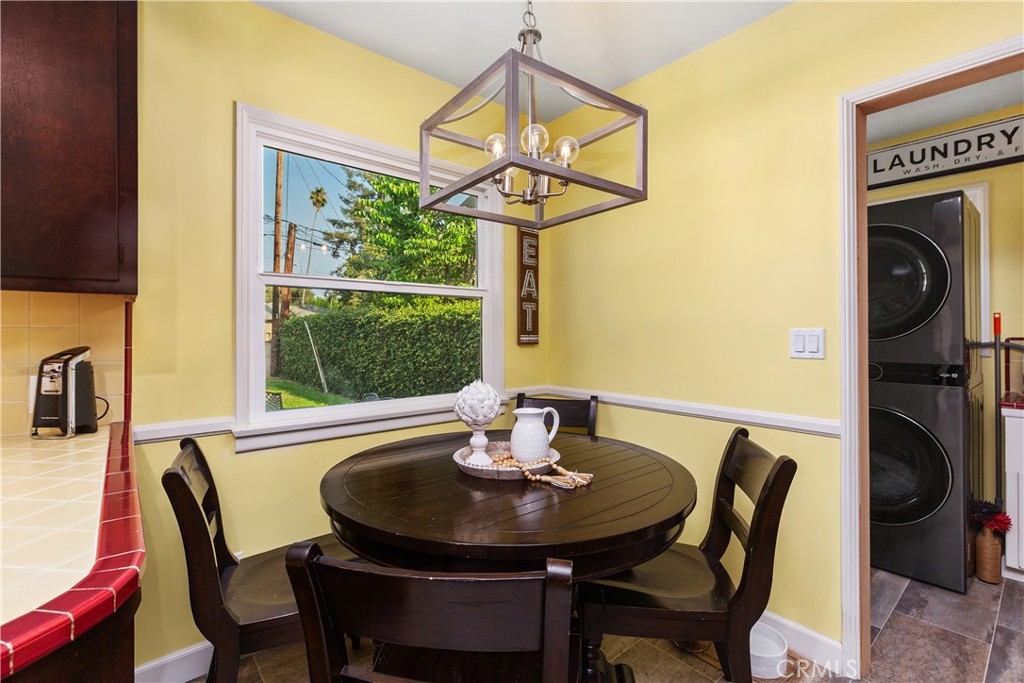 206 Melrose Avenue Monrovia, CA 91016 - Photo 23 of 35 a view of a dining room with furniture window and outside view