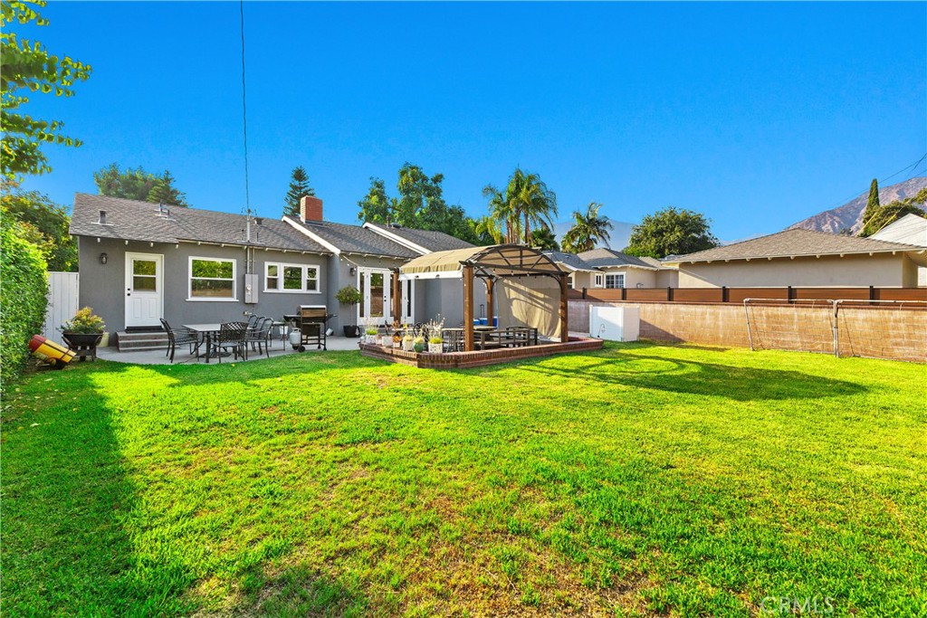 206 Melrose Avenue Monrovia, CA 91016 - Photo 29 of 35 a front view of a house with garden and porch