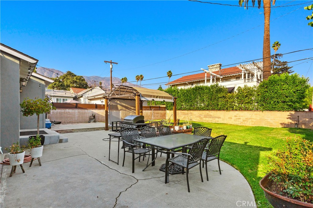206 Melrose Avenue Monrovia, CA 91016 - Photo 30 of 35 a view of an chairs and table in the patio