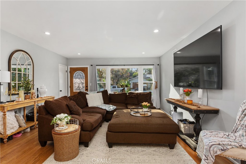 206 Melrose Avenue Monrovia, CA 91016 - Photo 9 of 35 a living room with furniture and a flat screen tv