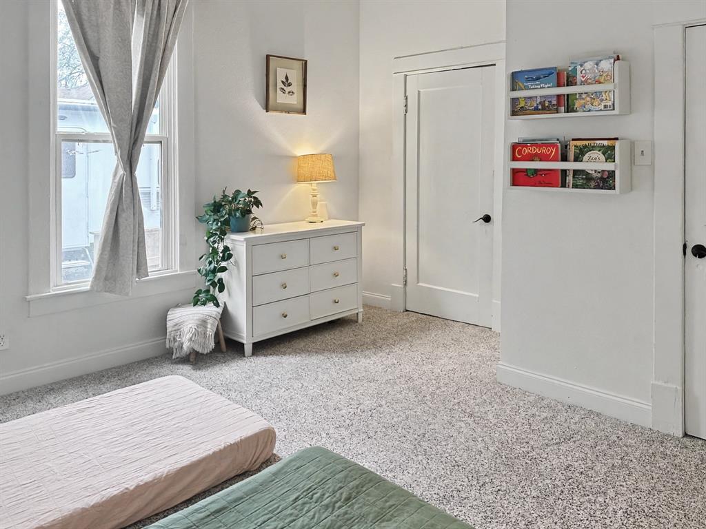 1517 Cumberland Avenue Waco, TX 76708 - Photo 17 of 30 a room with a bed and a window