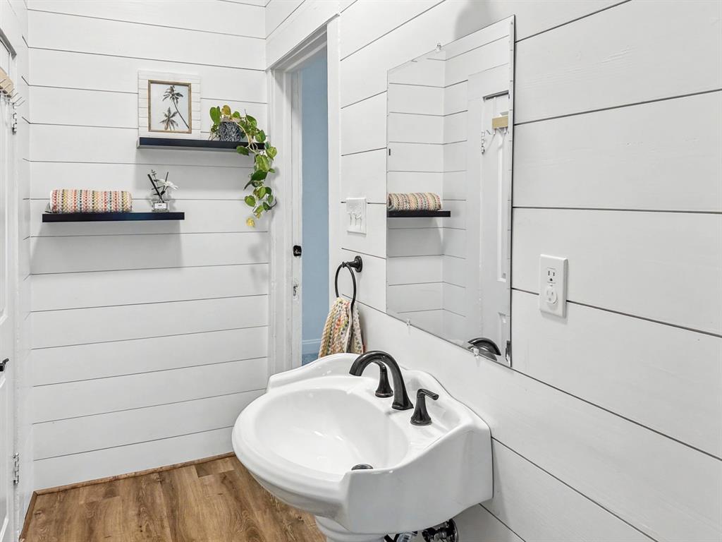 1517 Cumberland Avenue Waco, TX 76708 - Photo 19 of 30 a bathroom with a sink and a mirror