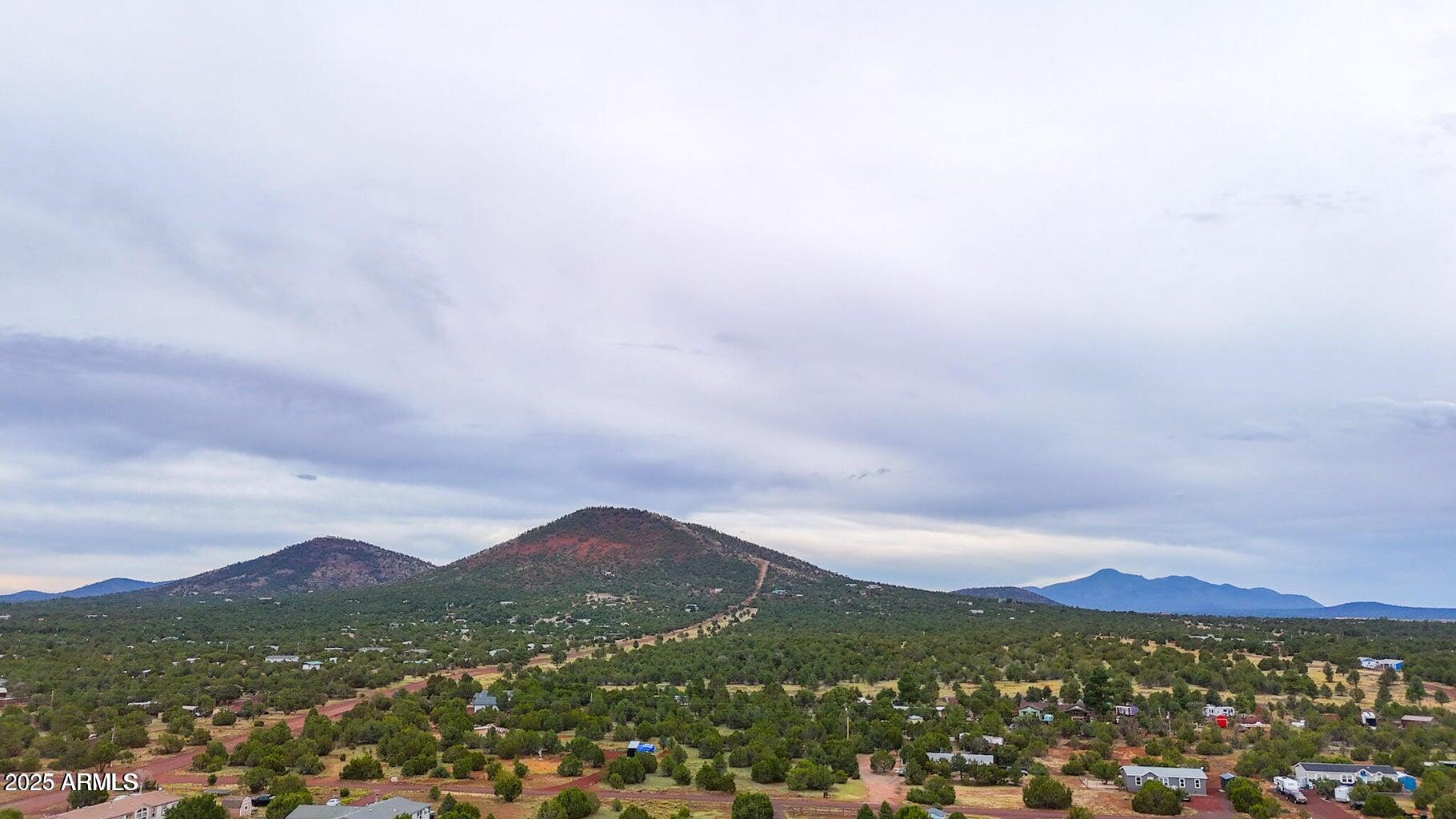 890-908 Hoctor Road Williams, AZ 86046 - Photo 9 of 17 a view of a city with mountains in the background