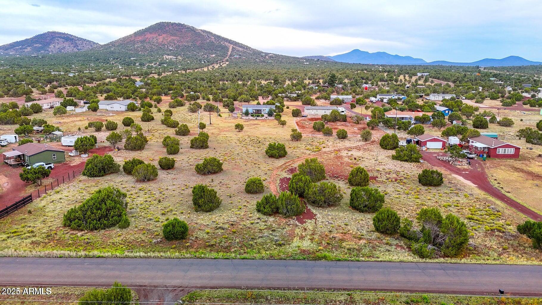 890-908 Hoctor Road Williams, AZ 86046 - Photo 10 of 17 a view of a city with a mountain