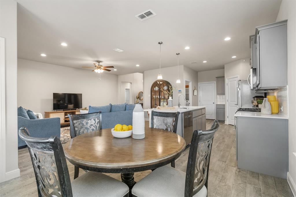 1864 Mensa Drive Haslet, TX 76052 - Photo 23 of 40 a view of a dining room with furniture