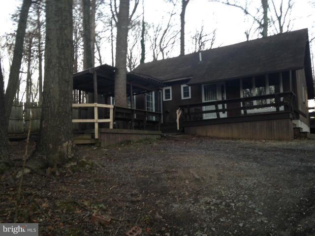 536 Platte Road Lusby, MD 20657 - Photo 1 of 8 a view of a house with a yard and sitting area