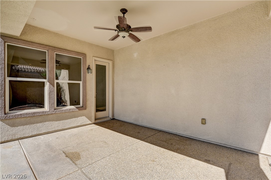 2793 Rosenhearty Drive Henderson, NV 89044 - Photo 62 of 85 This covered patio offers a refreshing breeze with an outdoor ceiling fan, perfect for relaxed enjoyment.
