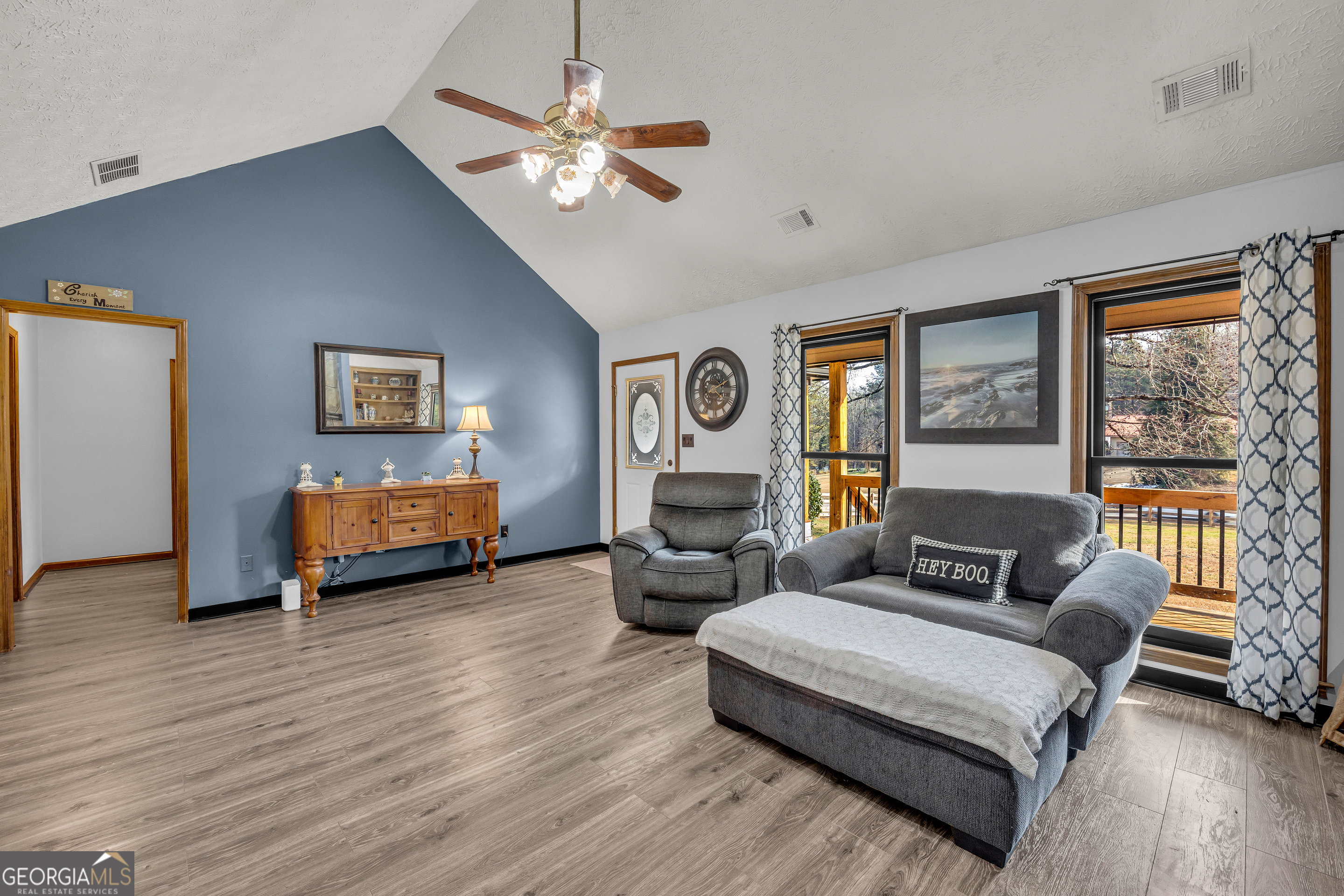 233 Kennedy Sells Road Northwest Auburn, GA 30011 - Photo 13 of 52 a living room with furniture and wooden floor