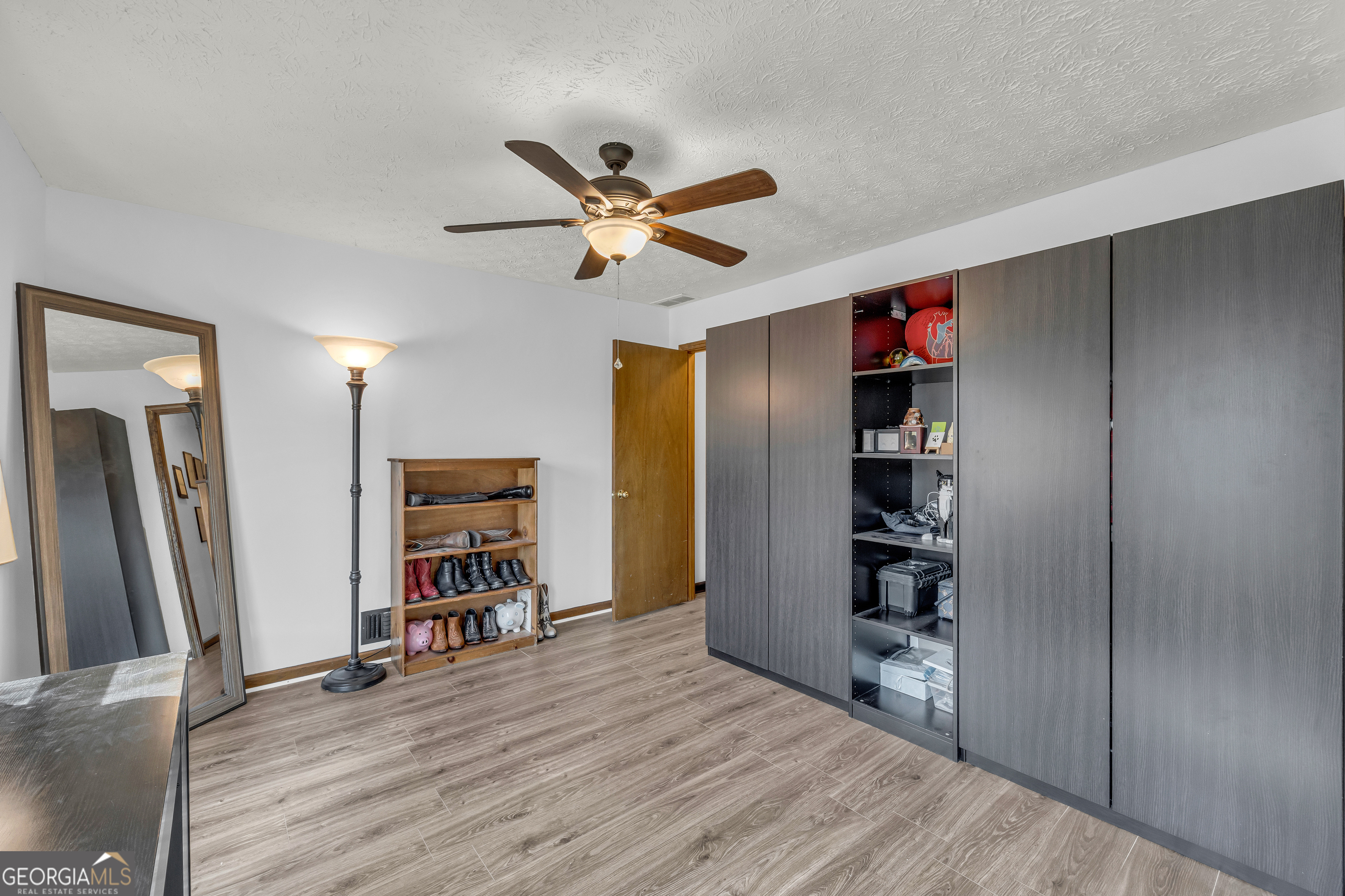233 Kennedy Sells Road Northwest Auburn, GA 30011 - Photo 33 of 52 wooden floor in an empty room with a window