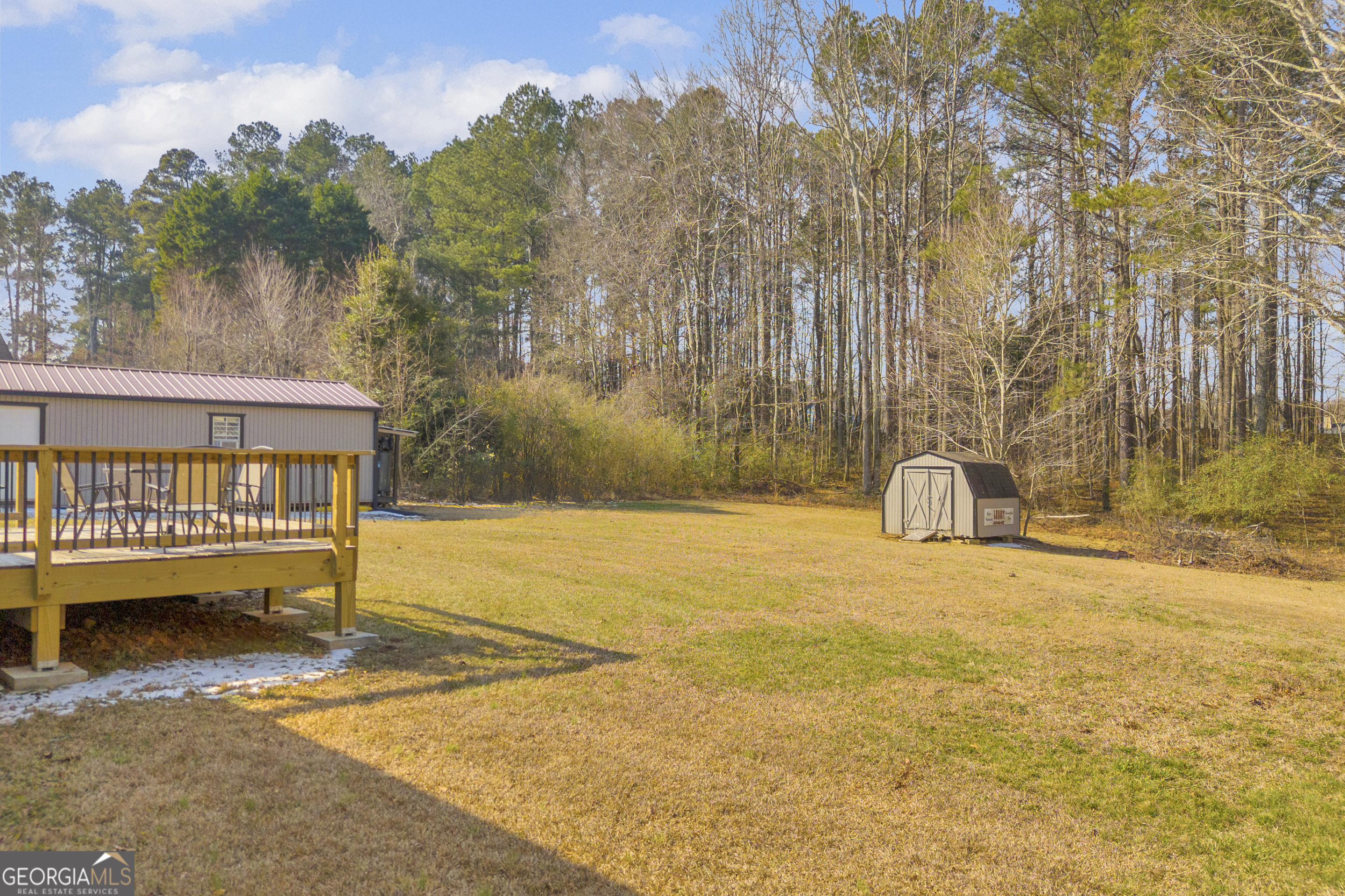 233 Kennedy Sells Road Northwest Auburn, GA 30011 - Photo 41 of 52 a view of a swimming pool with a slide
