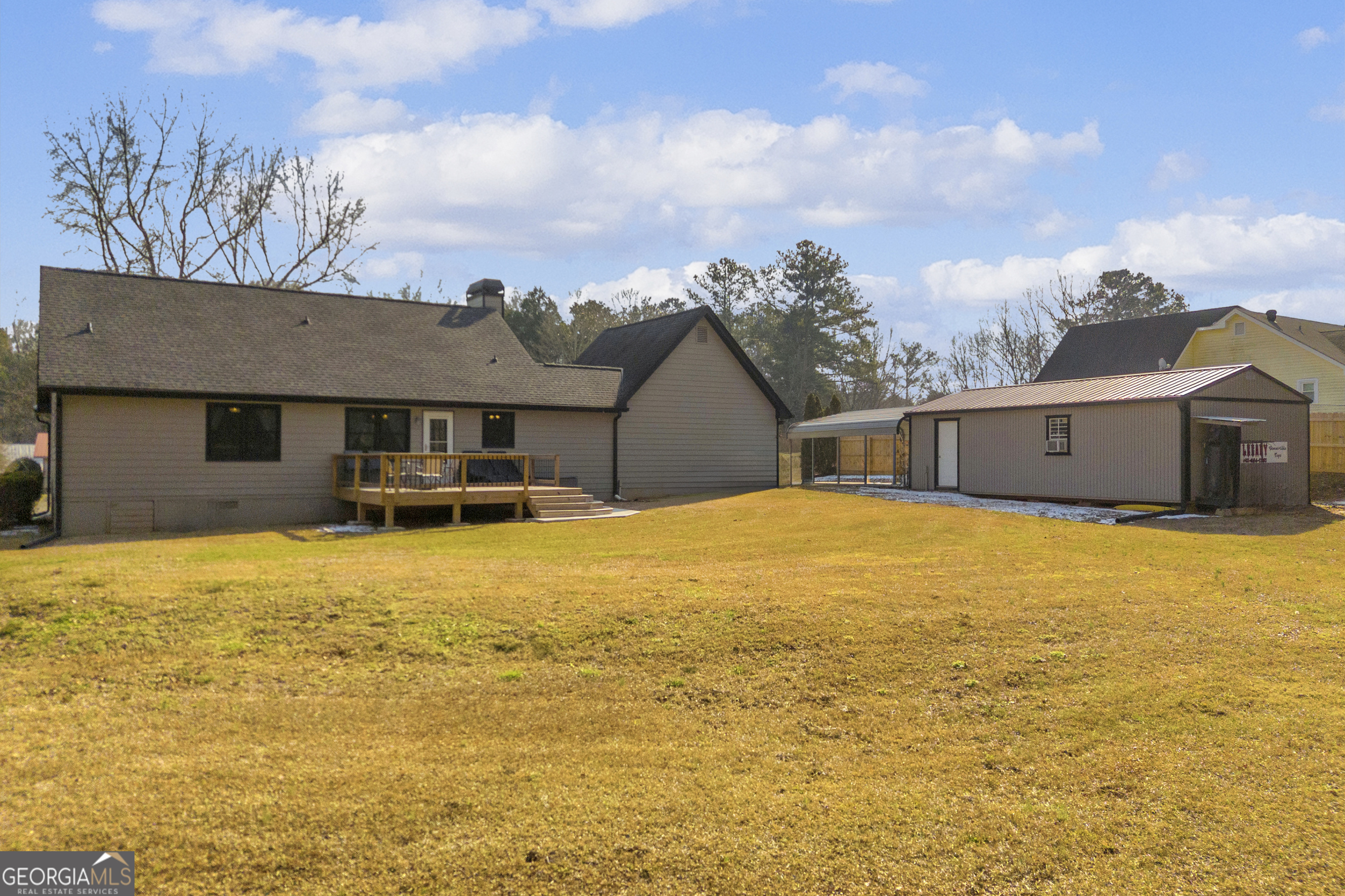 233 Kennedy Sells Road Northwest Auburn, GA 30011 - Photo 44 of 52 a front view of a house with a yard