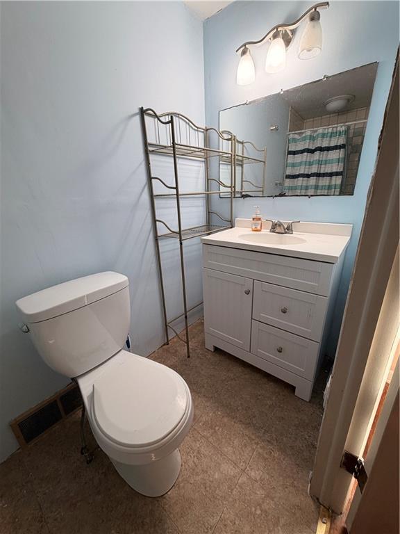 142 Community Park Road Freeport, PA 16229 - Photo 13 of 22 a bathroom with a toilet sink and mirror