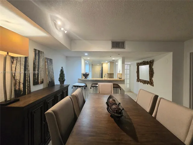 a view of room with table and chair