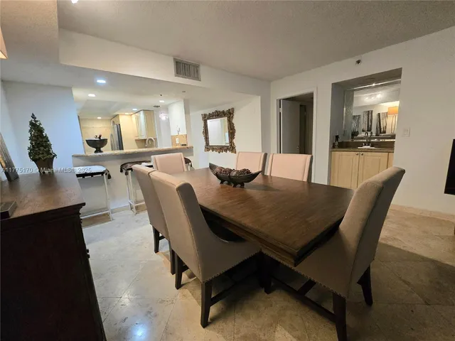 a view of room with a desk and chair