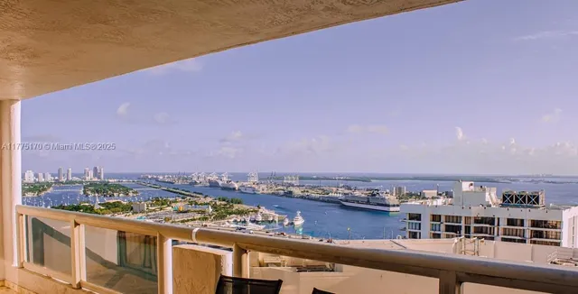 a view of a city with tall buildings