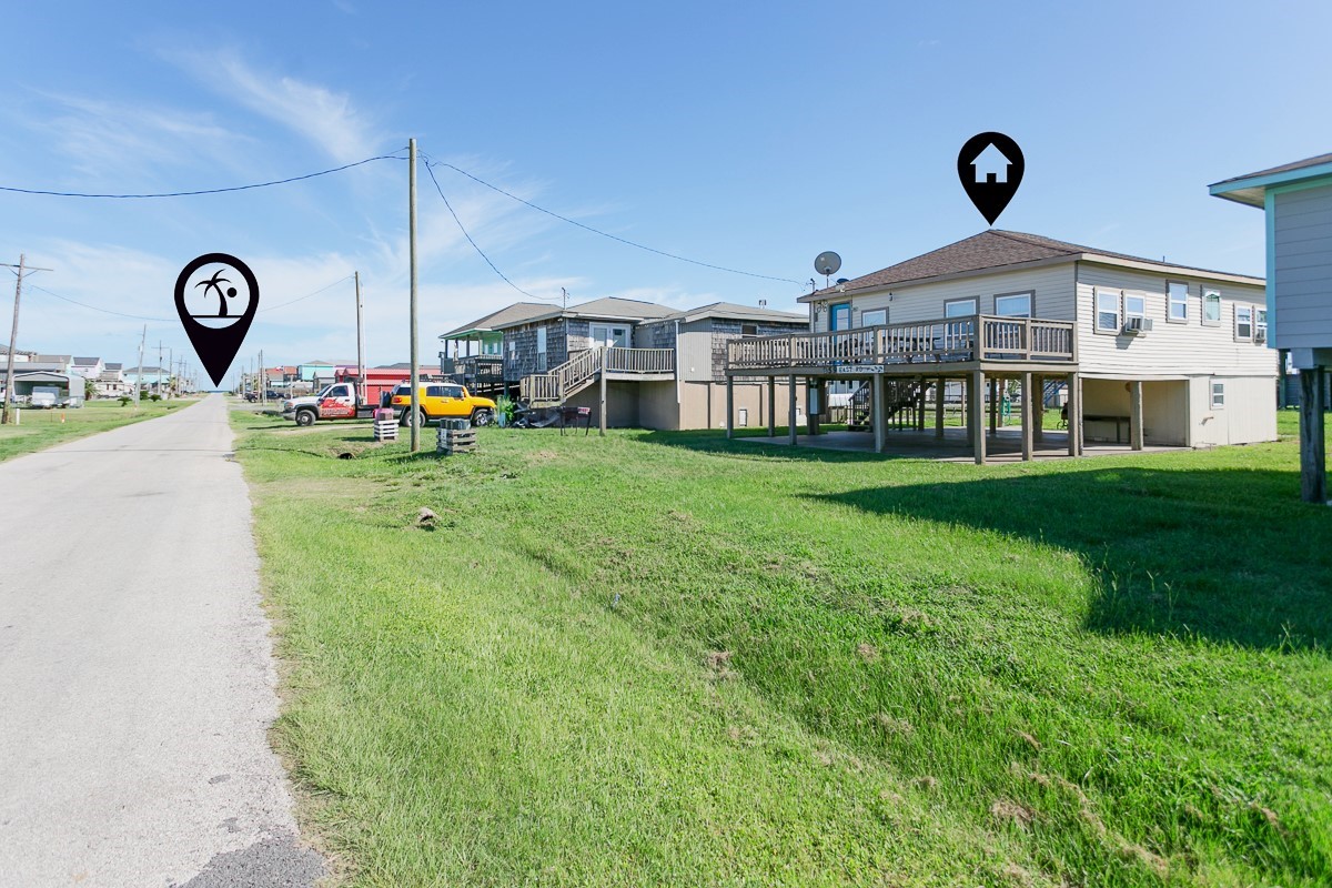 959 South East Road Crystal Beach, TX 77650 - Photo 6 of 20 a front view of a house with garden