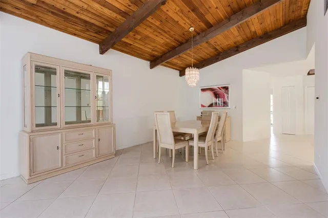 a view of a livingroom with furniture and a ceiling fan