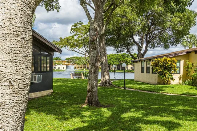 a view of swimming pool with a yard