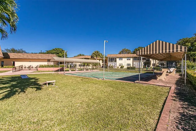 a room with furniture and wooden floor