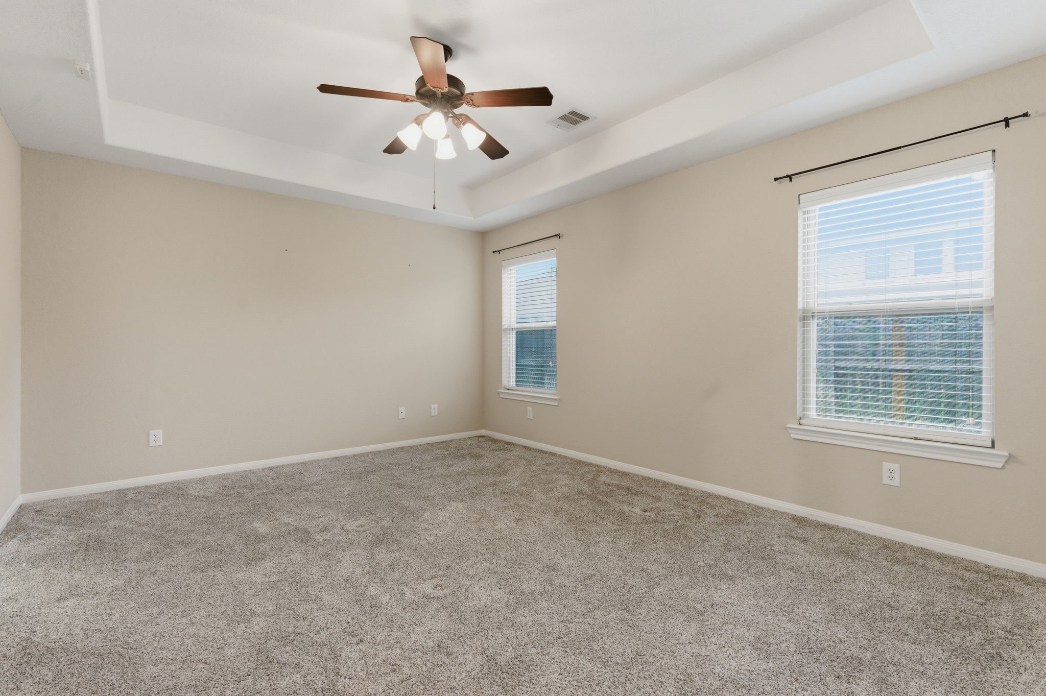 21822 Mount Hunt Drive Spring, TX 77388 - Photo 14 of 26 Luxurious Primary Suite with Elegant Tray Ceiling.