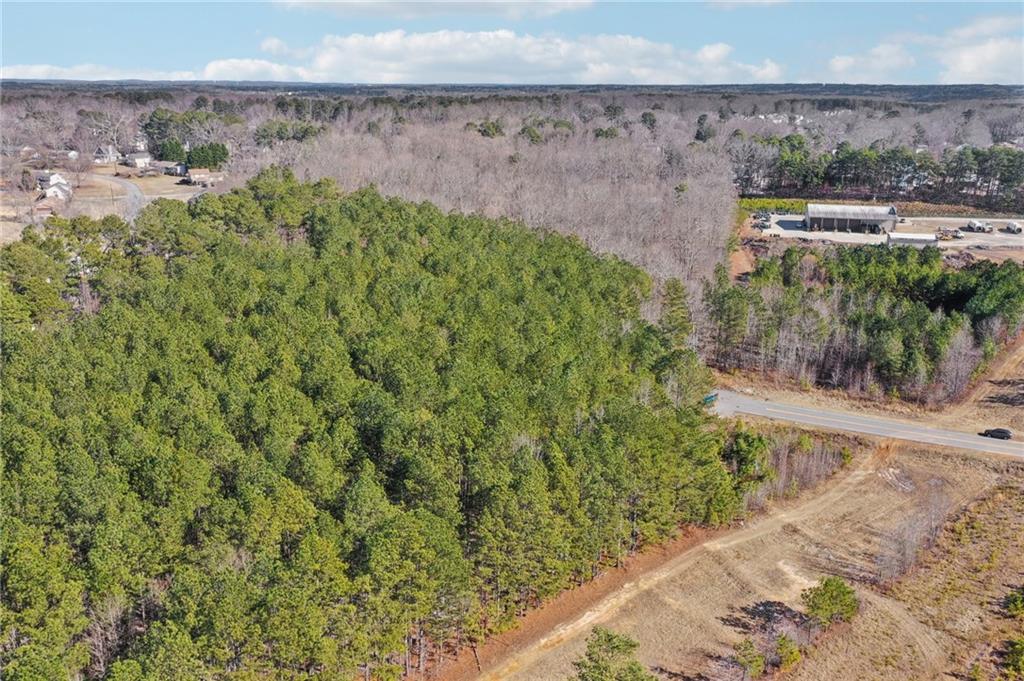 762 Harbins Road Dacula, GA 30019 - Photo 9 of 18 a view of a garden with an outdoor space