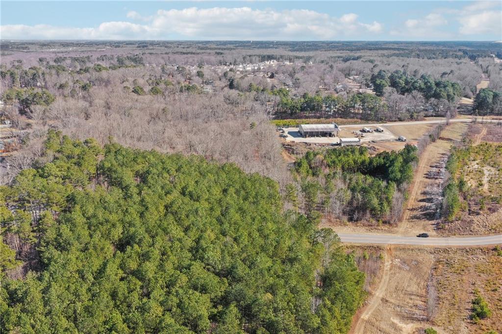 762 Harbins Road Dacula, GA 30019 - Photo 10 of 18 an aerial view of house with outdoor space
