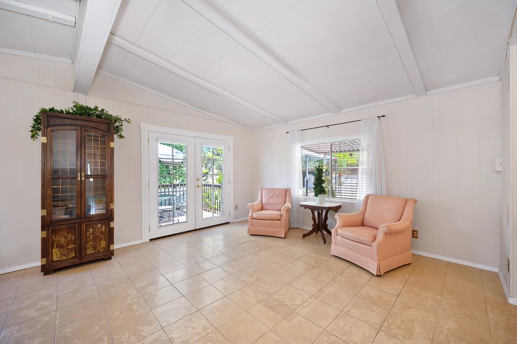 6374 Brodie Drive Newcastle, CA 95658 - Photo 14 of 50 a living room with furniture and a large window
