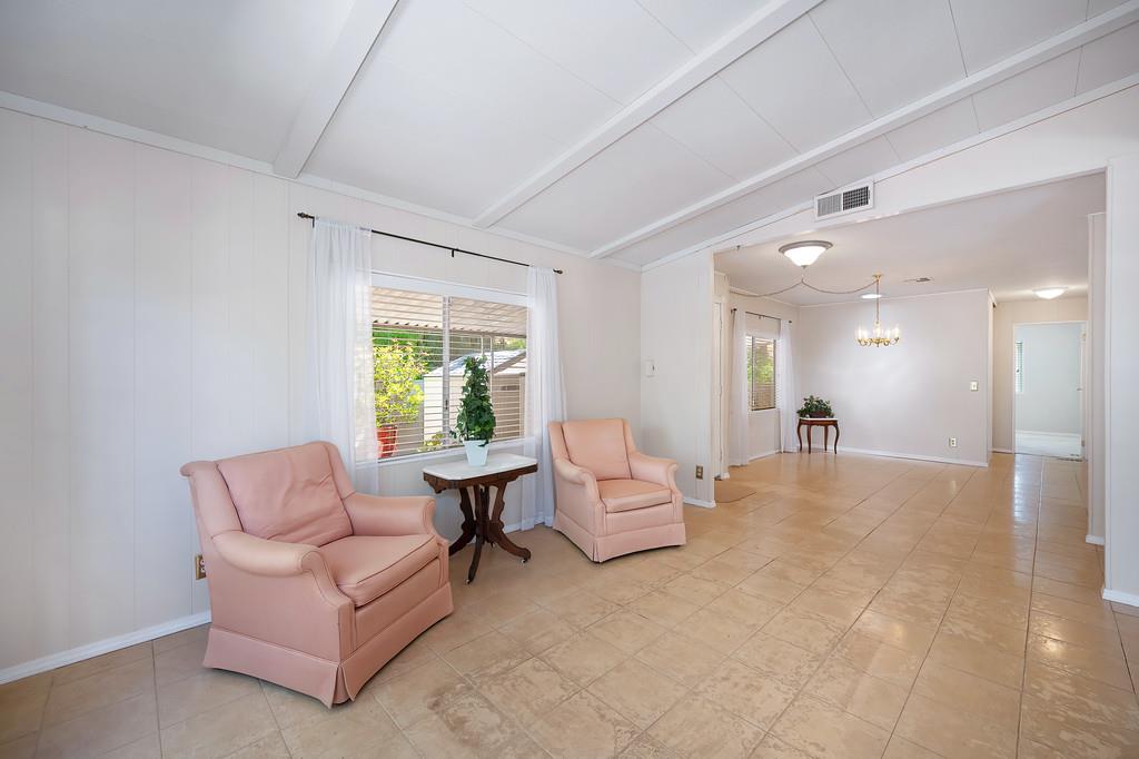6374 Brodie Drive Newcastle, CA 95658 - Photo 16 of 50 a living room with furniture and a large window