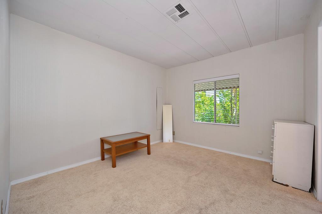 6374 Brodie Drive Newcastle, CA 95658 - Photo 28 of 50 a living room with furniture and a window