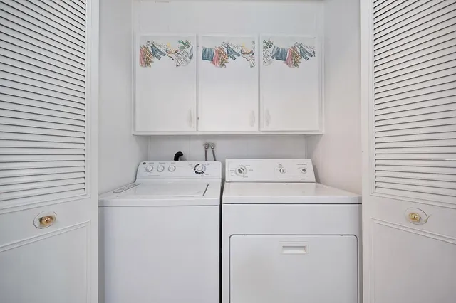 a view of backyard with patio