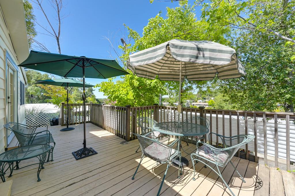 6374 Brodie Drive Newcastle, CA 95658 - Photo 42 of 50 a view of a chair and table on the deck