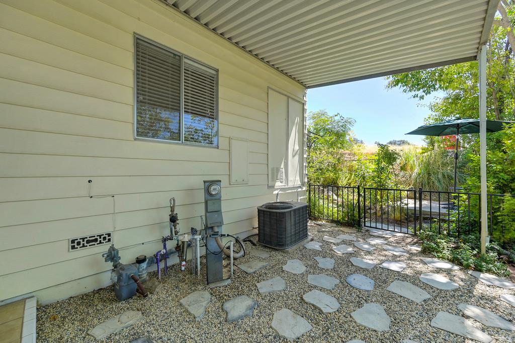 6374 Brodie Drive Newcastle, CA 95658 - Photo 48 of 50 a view of a porch with chairs and backyard