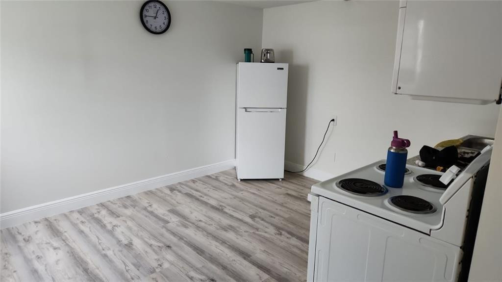 11868 Watergate Circle Boca Raton, FL 33428 - Photo 3 of 21 Unit 1: Living / Kitchen area
