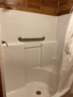 11497 Coon Hollow Road Conroe, TX 77306 - Photo 15 of 45 a close view of a bathtub in a bathroom