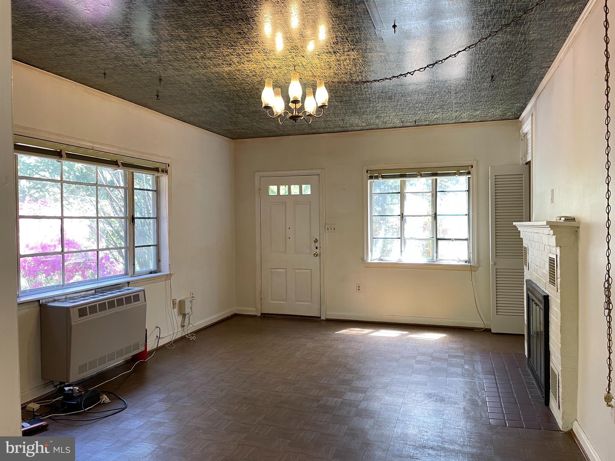 1617 Glenallan Avenue Silver Spring, MD 20902 - Photo 7 of 32 living dining w wood burning fireplace