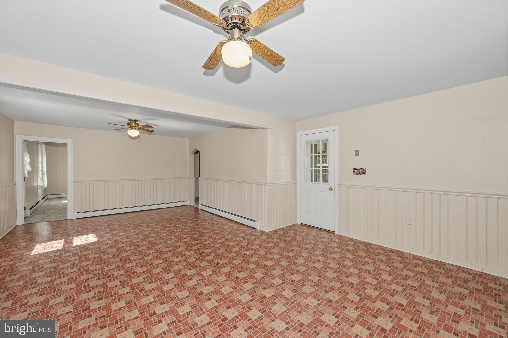 11205 Hessong Bridge Road Thurmont, MD 21788 - Photo 15 of 69 a view of a room with a ceiling fan and a window