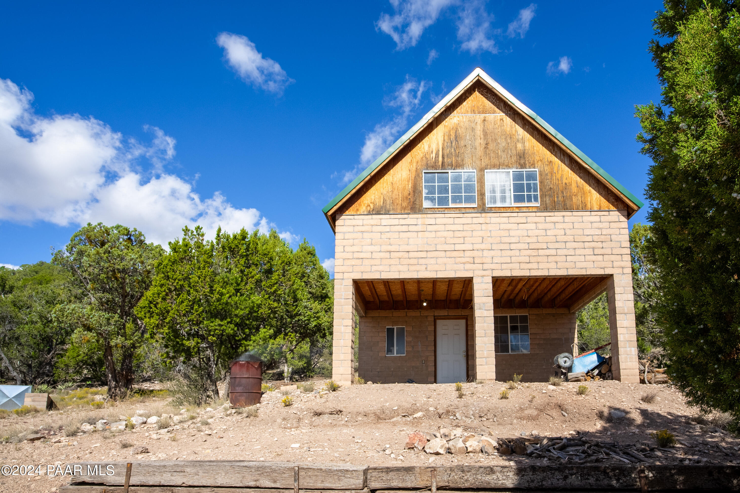 887 North Whiskey Way Seligman, AZ 86337 - Photo 19 of 36 a view of a house with a yard