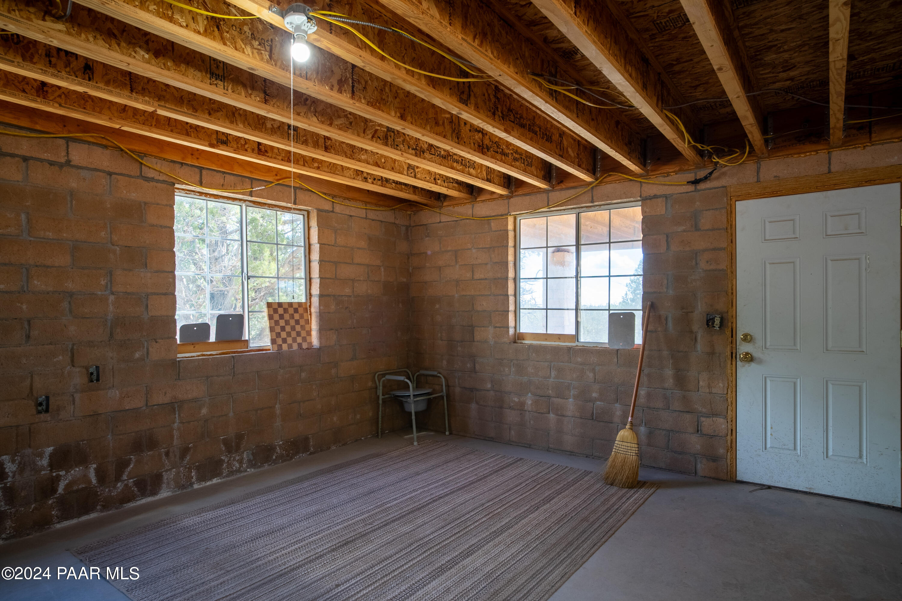 887 North Whiskey Way Seligman, AZ 86337 - Photo 5 of 36 a view of an empty room with a window