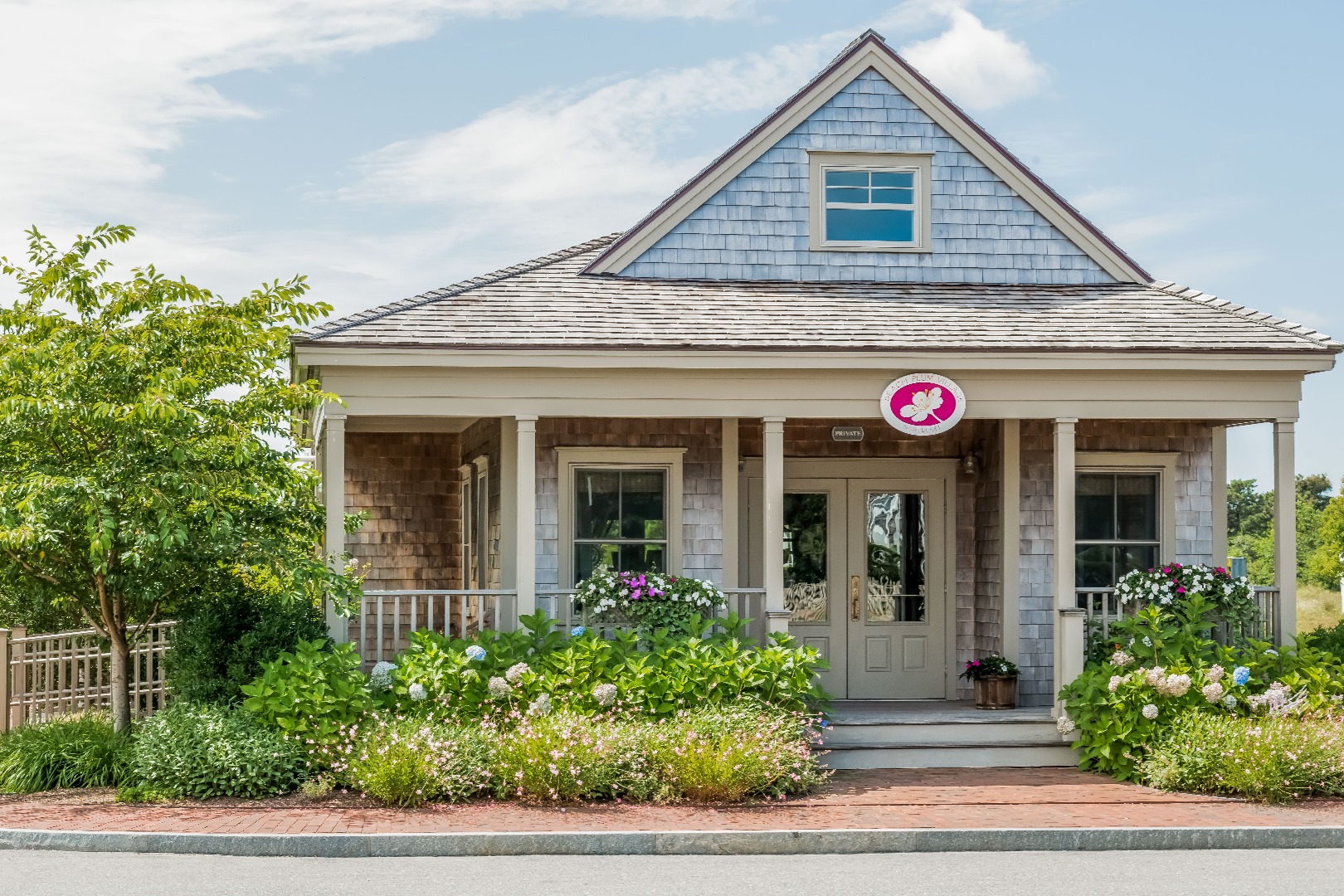 16 Blazing Star Road Nantucket, MA 02554 - Photo 30 of 35 a view of a house with potted plants