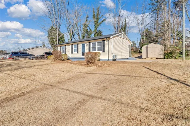 a house with trees in front of it