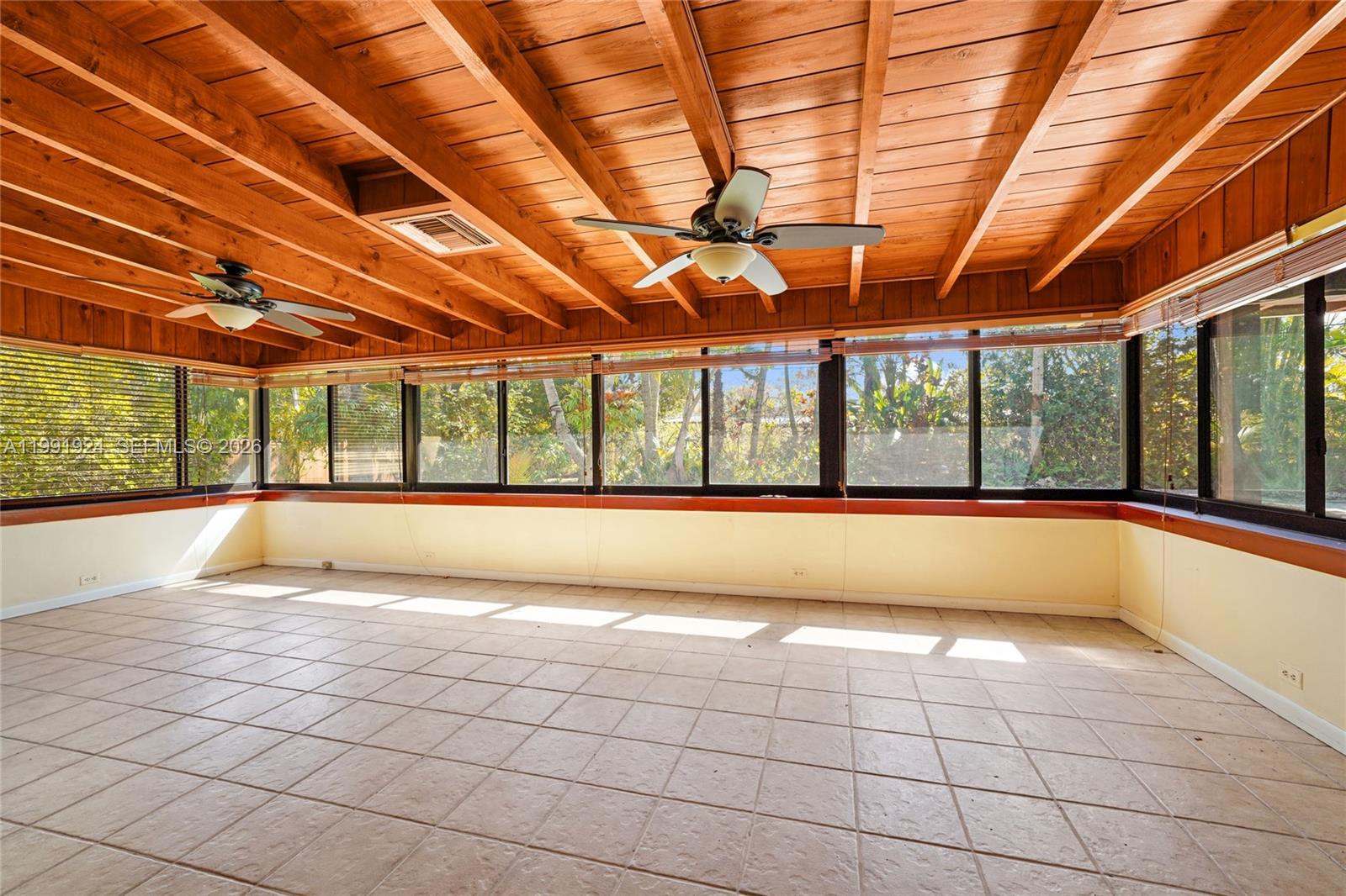 8250 Southwest 95th Street Miami, FL 33156 - Photo 2 of 21 a view of an empty room with windows
