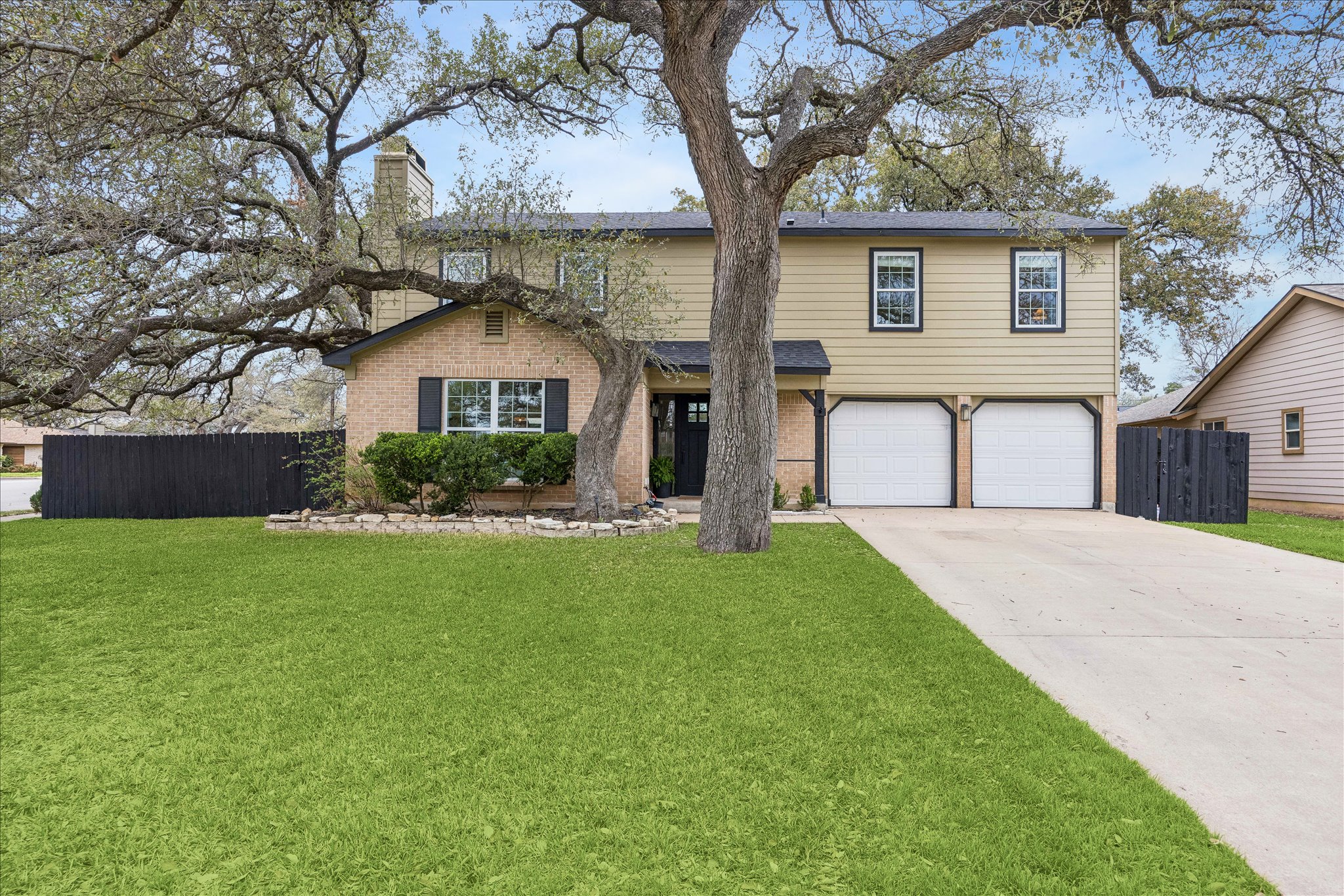 12935 Pegasus Street Austin, TX 78727 - Photo 9 of 38 Situated on an over sized, wooded corner lot with fabulous trees for plenty of shade
