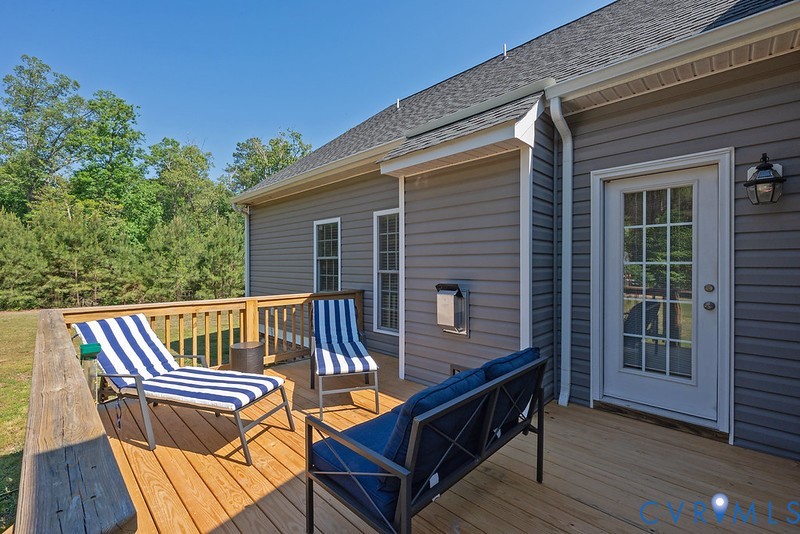 9425 Marie Road New Kent, VA 23124 - Photo 18 of 55 a view of sitting area with furniture and wooden deck