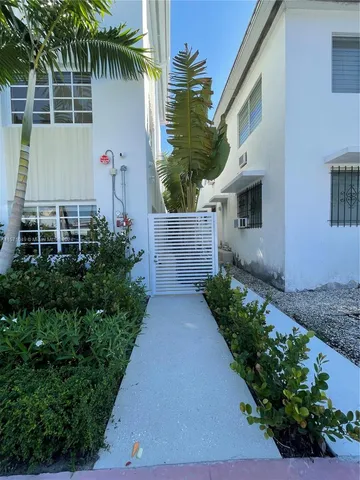 a view of a garden with pathway